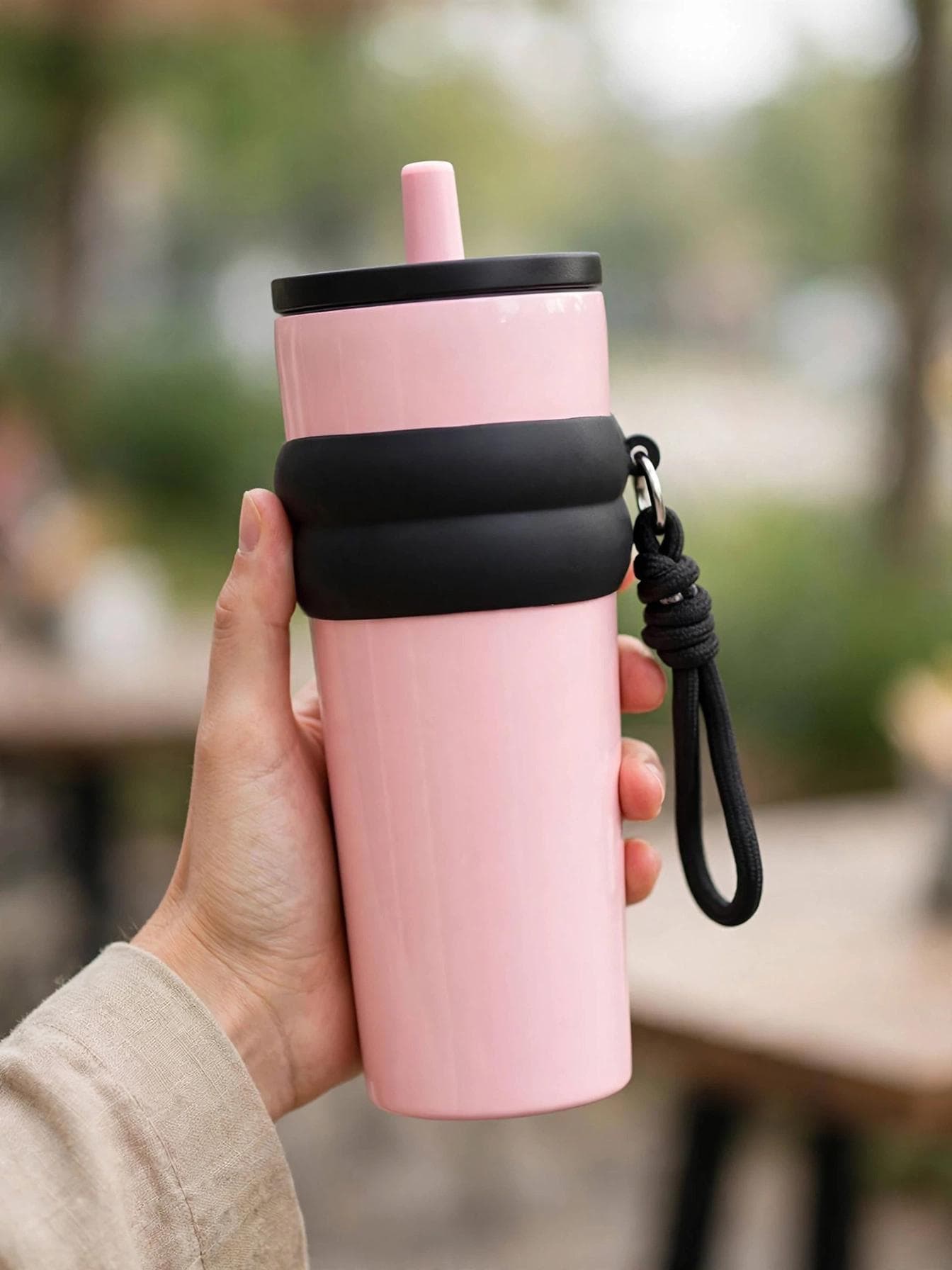 Pastel Pink Tumbler with Black Silicone Grip & Braided Strap